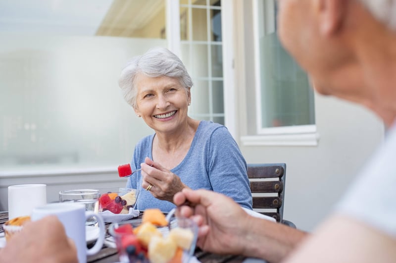 two seniors dining